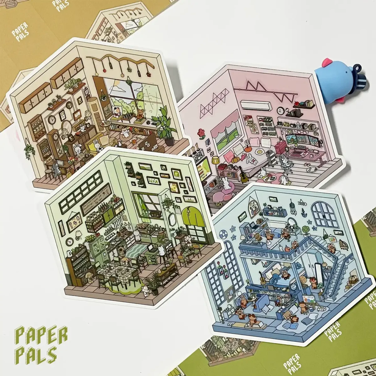 The Life Party | 3D Scene Stickers from ASMR Stickers bring four lively home environments to life. This miniature sticker collection features a living room, gaming room, kitchen, and bedroom, each designed with intricate details and vibrant colors. Living Room showcases a cozy space with plush furniture, decorative plants, and a warm ambiance, creating a welcoming atmosphere. Gaming Room is packed with gaming consoles, screens, controllers, and neon lights, capturing the excitement of a gamer’s paradise. Kitchen highlights a bustling cooking area with stoves, baking tools, fresh ingredients, and delicious meals, making it perfect for food lovers. Bedroom presents a relaxing retreat with a comfy bed, personal items, and a computer setup, reflecting a cozy and personalized space. Perfect for DIY sticker decoration, planner embellishments, and creative journaling, these 3D scene stickers are ideal for sticker collectors, ASMR enthusiasts, and home decor lovers. Their high-quality, reusable design makes them great for scrapbooks, lifestyle crafts, and creative expression. Experience the charm of everyday life with this beautifully crafted sticker set!