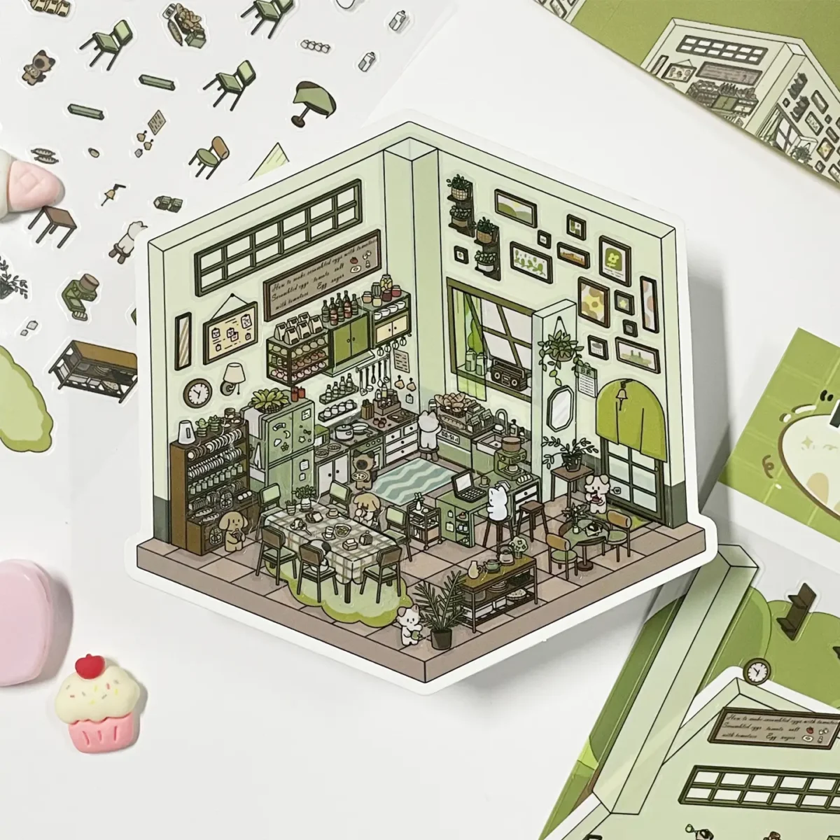 The Life Party | 3D Scene Stickers — Kitchen from ASMR Stickers brings a lively and cozy cooking space to life. This miniature sticker scene features a well-organized kitchen filled with cabinets, shelves stocked with jars and bottles, a refrigerator, a stove, and a sink, creating a warm and inviting atmosphere. The scene showcases adorable animal characters engaging in various activities, such as cooking, cleaning, and dining, adding charm and storytelling. The walls are adorned with framed pictures and plants, while the dining table is set with plates and cups, enhancing the homely aesthetic. Surrounding the main sticker are additional smaller stickers, including chairs, tables, and kitchen essentials, making the scene dynamic and interactive. Perfect for DIY sticker decoration, planner embellishments, and creative journaling, this 3D scene stickers is ideal for sticker collectors, ASMR enthusiasts, and home decor lovers. Its high-quality, reusable design makes it a great addition to scrapbooks, lifestyle crafts, and creative expression. Experience the warmth and joy of a beautifully designed kitchen with this delightful sticker set! You can find more details here.