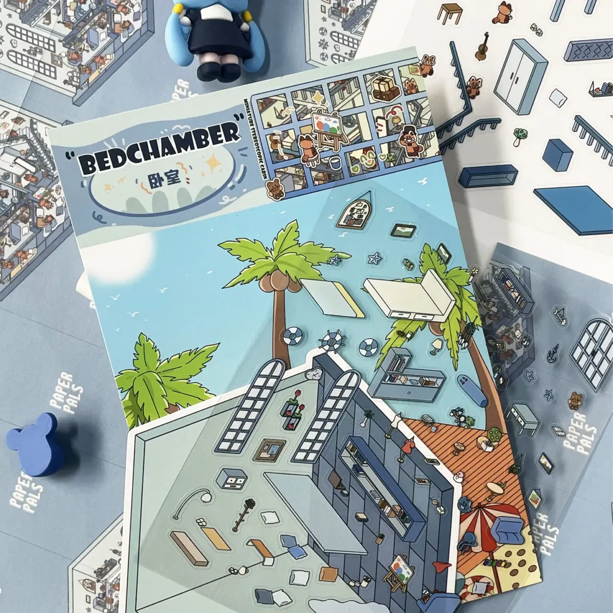 The Life Party | 3D Scene Stickers — Bedroom from ASMR Stickers brings a cozy and personalized living space to life. This miniature sticker scene features a charming bedroom filled with plush furniture, decorative elements, and adorable characters, creating a warm and inviting atmosphere. The scene showcases characters engaging in various activities, such as reading, playing musical instruments, and relaxing, adding depth and storytelling. The two-level design includes a bed, desk, shelves, and a staircase, enhancing the immersive experience. Surrounding the main sticker are additional smaller stickers, including windows, furniture, and accessories, allowing for customization and creativity. Perfect for DIY sticker decoration, planner embellishments, and creative journaling, this 3D scene stickers is ideal for sticker collectors, ASMR enthusiasts, and home decor lovers. Its high-quality, reusable design makes it a great addition to scrapbooks, lifestyle crafts, and creative expression. Experience the charm and comfort of a beautifully designed bedroom with this delightful sticker set!