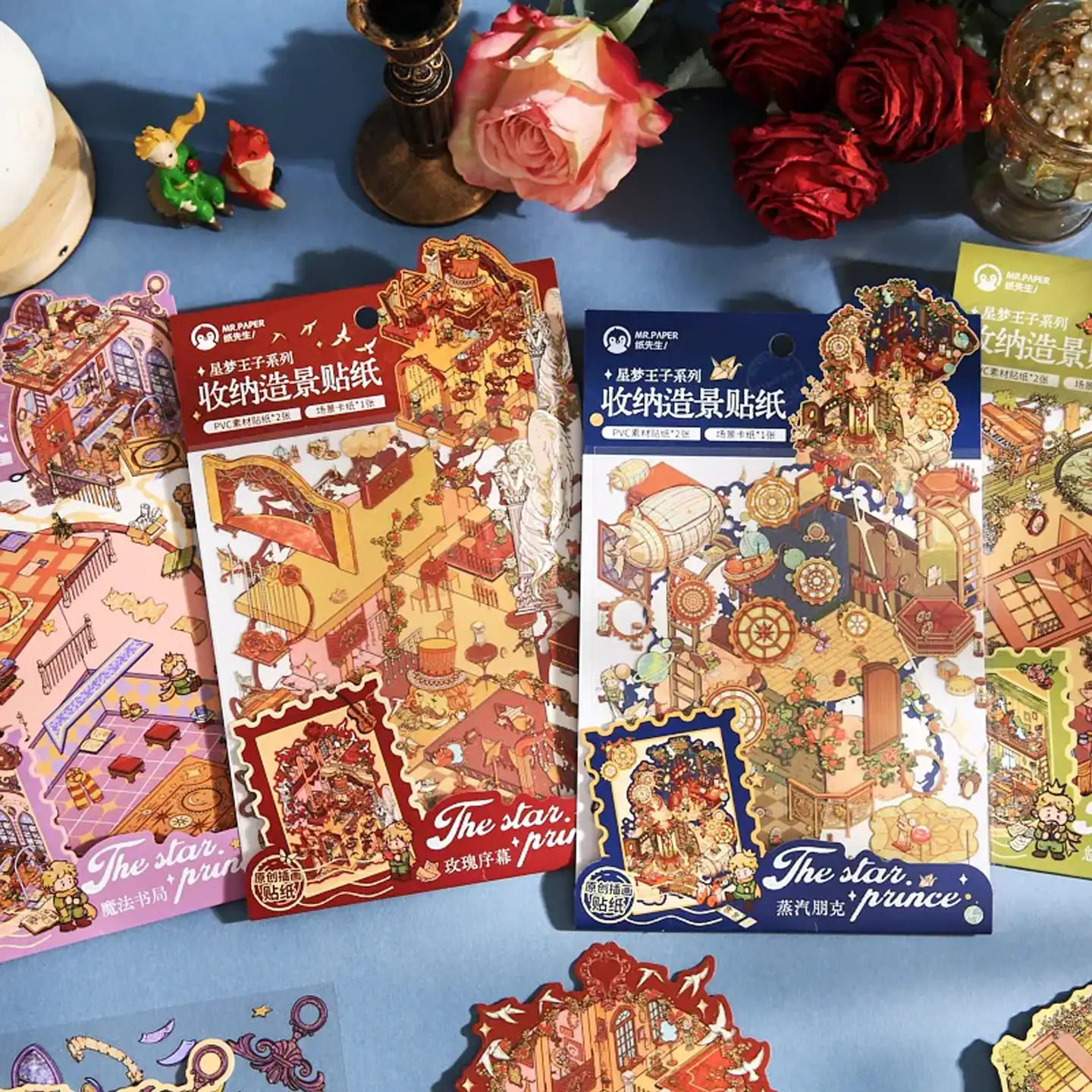 The Little Prince Scene Stickers | 2.0 Series – 4 Themes: Tranquil Greenhouse, Magical Bookstore, Rose Prelude, Steampunk Dream from ASMR Stickers brings four enchanting miniature worlds to life. Each 3D scene sticker is intricately designed, blending fantasy and elegance with rich storytelling elements. The Tranquil Greenhouse theme features a cozy botanical retreat filled with lush greenery, a piano, and a loft adorned with books and plants, creating a serene atmosphere. The Magical Bookstore transports you to a whimsical literary haven, where towering bookshelves, antique lamps, and hidden corners invite exploration. Rose Prelude captures the delicate beauty of blooming roses, evoking a poetic and romantic ambiance. Meanwhile, Steampunk Dream showcases a futuristic yet vintage-inspired world, complete with intricate gears, brass accents, and imaginative machinery. Perfect for DIY sticker decoration, planner embellishments, scrapbooking, and creative journaling, this high-quality, reusable sticker set is ideal for art lovers, ASMR enthusiasts, and collectors. Elevate your projects with these beautifully crafted stickers, each offering a unique and immersive experience filled with creativity and charm. You can find more details here.