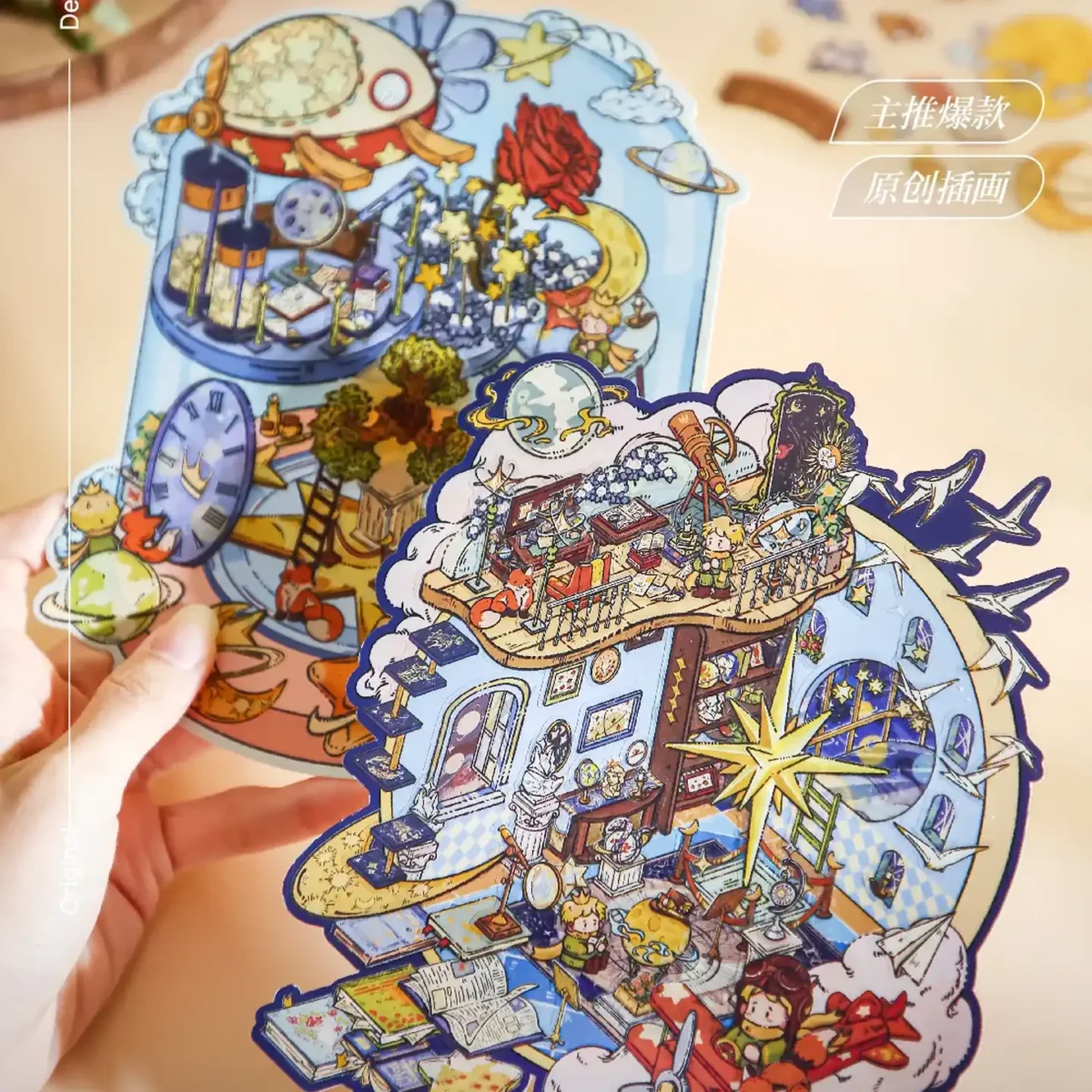 The Little Prince Scene Stickers | 1.0 Series – Star Museum from ASMR Stickers invites you to explore a dazzling world of celestial wonder. This 3D scene sticker depicts an enchanting museum filled with stellar artifacts and astronomical motifs. A magnificent golden star stands proudly at its center, surrounded by telescopes, vintage books, and intricately detailed globes. The Little Prince perches on a balcony, gazing at the cosmos, while another playful character pilots a tiny airplane, adding a spirit of adventure. Every element—from delicate star motifs to meticulously illustrated exhibits—blends fantasy with scientific marvel, creating an immersive display that captivates the imagination. Perfect for DIY sticker decoration, planner embellishments, and creative journaling, this high-quality, reusable sticker set is ideal for art lovers, ASMR enthusiasts, and collectors seeking unique design treasures. Elevate your projects with the magical allure of the Star Museum and experience a universe of creative inspiration unlike any other.