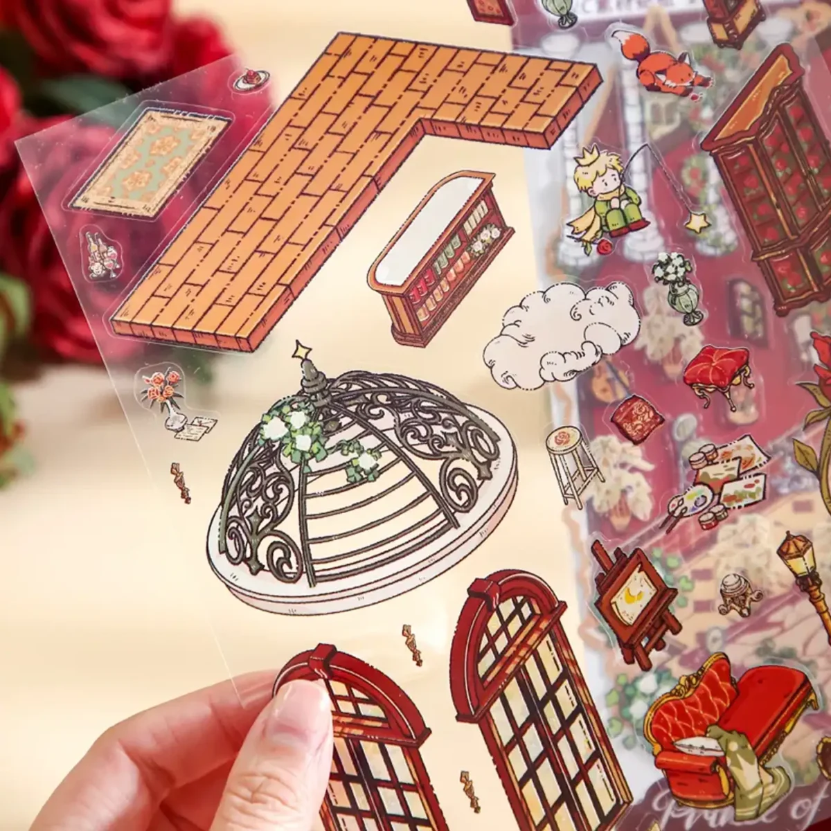 The Little Prince Scene Stickers | 1.0 Series – Rose Collector from ASMR Stickers transports you into a magical garden realm where delicate roses bloom in soft pastel hues. This meticulously designed 3D scene sticker showcases a charming Little Prince as he quietly admires a cluster of intricately illustrated roses. The subtle interplay of light and shadow accentuates every petal, evoking the poetic essence of the beloved tale and inspiring artistic expression. Perfect for DIY sticker decoration, planner embellishments, scrapbooking, and creative journaling, this high-quality, reusable sticker set is ideal for art lovers, ASMR enthusiasts, and collectors seeking unique miniature treasures. Its durable design ensures that every project transforms into a captivating narrative filled with literary charm and stylish allure. Bring a touch of literary magic and creative wonder to your surfaces with this exquisitely crafted Rose Collector sticker set.